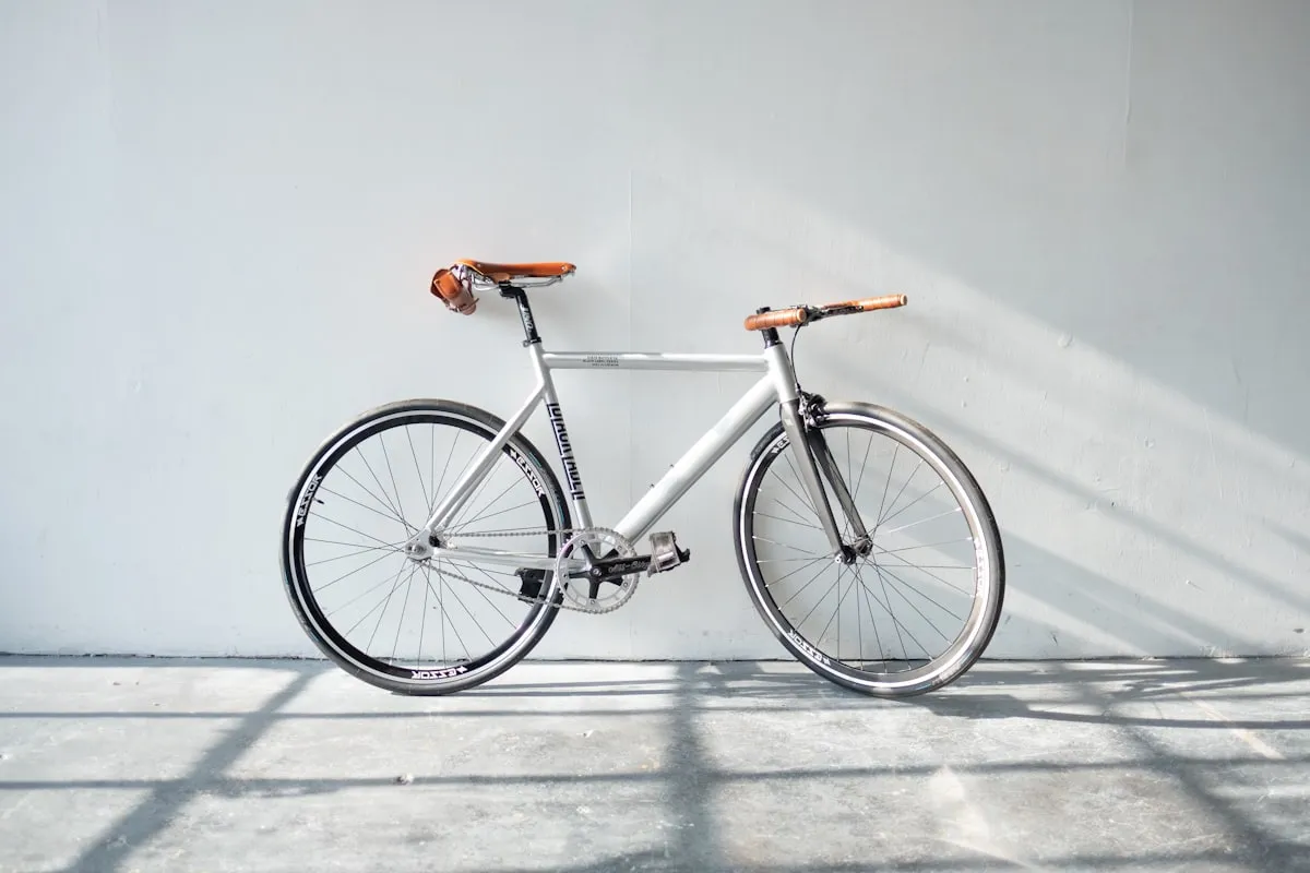 Several electric bicycles lined up for display in a retail showroom